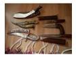 Antique Kukri and Daggers. A kukri and three oriental....