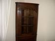 Antique corner cupboard in medium